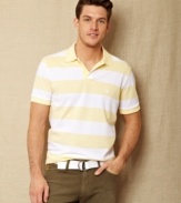 Earn your stripes. This polo from Nautica has a slim fit to accent your trim summer look.