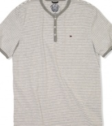 This striped henley t-shirt from Tommy Hilfiger is a solid addition to your warm-weather style.