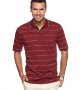 Turn classic style up a notch. Basic gets bolstered with this striped polo shirt from Van Heusen.