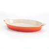 The largest version of the beloved Le Creuset au gratin dish, this bright kitchen essential takes your creations from freezer to oven to table in classic style.