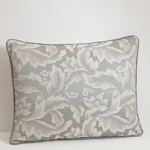 Shimmering in a platinum floral print, this sham adds a touch of refined charm to your bedroom. Accented with a contrasting border.