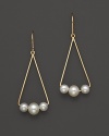 Gleaming freshwater pearls add luster to 14K. yellow gold.