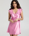 Soft, layered ruffles and a sheer back panel lend fabulously feminine style to this v-neck chemise from Oscar de la Renta Pink Label.