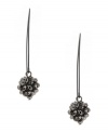 Get party-perfect style in an instant. Kenneth Cole New York earrings feature silver glass beads and fireballs strung from a pull-through backing crafted in hematite tone mixed metal. Approximate drop: 2 inches.