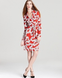 DIANE von FURSTENBERG's signature wrap dresses are the ultimate investment piece for timeless style. The bold chain print of this version makes a statement for idiosyncratic chic.