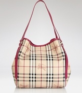 Give your look a classic finish with Burberry's leather-trimmed tote in the brand's iconic check.