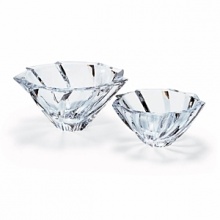 Serve with a twist. Brilliantly cool, clear crystal gets texture and interest, and is the perfect backdrop for brightly hued fruits and vegetables. Matching vases similarly complement lush floral arrangements. Shown left to right: 4 1/2H x 9 7/8 diam. bowl, 3 5/8H x 8 1/8: diam. bowl. Also available: 8 5/8H vase, 9 7/8H vase.