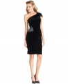 This chic velvet one-shoulder dress from Xscape is gathered with a brilliant sequined embellishment at the waist.