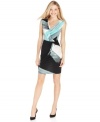 Calvin Klein's painterly printed dress features a gorgeous cowlneck silhouette with a twist at the hip.