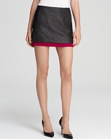 This DIANE von FURSTENBERG mini skirt flaunts a peek-a-boo hem of vibrant color for an unexpected flash of hue.