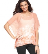 In a sheer floral-printed fabric, this poncho-style Alfani top is a hot spring layering piece!