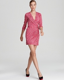 Tailored in DIANE von FURSTENBERG's signature wrap silhouette, this richly printed dress will take you from season to season in classically cool style.