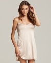 Sleep soundly in this ultra soft sleeveless dress with a flattering draping fit.