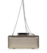 Hard-edge elegance gets an impossibly glamorous twist in Diane von Furstenbergs metallic twill clutch, finished to perfection with a flawless patent leather back - Metal frame, hinged top closure, removable chain-link shoulder-strap, inside back wall slot pocket - Pair with cocktail dresses and statement pumps