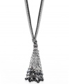 Boho chic at its best. A trendy tassel pendant stands out on this stylish necklace from c.A.K.e. by Ali Khan. Adorned with glass faceted rondelle beading and crystals, it features a suede cord. Crafted in silver tone mixed metal. Approximate length: 30 inches + 3-inch extender. Approximate drop: 5 inches.