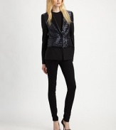 This crisply tailored blazer is embellished with shimmering sequined front and back panels.Velvet lapelsFront button closureWelt pocketsSequined overlay panelFully linedAbout 26 from shoulder to hemShell: polyesterBody: 48% polyester/48% viscose/4% spandexDry cleanImportedModel shown is 5'10 (177cm) wearing US size 4. 