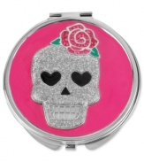 It's enough to make up the dead. This pink compact from Betsey Johnson is crafted from silver-tone mixed metal with a glittering skull on top, adorned with fuchsia and rose-colored accents. Item comes packaged in a signature Betsey Johnson Gift Box. Approximate length: 3 inches. Approximate width: 3 inches.