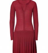 Pretty daytime looks get an edge of school-cool flair in Hoss Intropias merino wool dress, perfectly proportioned with a long, lean bodice and sharply pleated skirt - Rounded neckline with slit, long sleeves, dropped waistline, form-fitting top - Pair with statement accessories and chunky jewelry