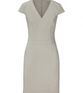 Elegant dress in fine, pale beige cotton blend - Especially comfortable and flattering, thanks to a touch of stretch - Slim-fitting sheath style, with darts at bust, deep v-neck and cap sleeves - Decorative pleat detail defines a trim waist - Pencil skirt hits above the knee - Zips at back - Sleek and streamlined, in a sophisticated summer hue - Pair with peep toe pumps, leather sandals or wedges