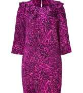 Work a wild edge into your wardrobe with Juicy Coutures tiger print silk dress - Rounded neckline, 3/4 sleeves, ruffled shoulders, slit with button closure at nape - Classic straight cut - Wear with chunky chain jewelry and jet black ankle boots