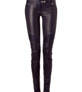 Rock n roll style goes ultra-luxe with these of-the-moment skinny leather pants from Balmain- Snap tab closure, belt loops, zip pockets, stitching details at fly, thighs, and back, seaming details, zips at hem, skinny fit, biker-style- Wear with an oversized top, a cropped blazer, and platform heels