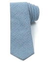 The vintage-inspired dot pattern of this mellow tie is offset by a modern skinny width for a cool, understated design that spruces up your look anywhere you go.