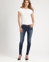 Enhance your weekend wardrobe with these ultra-stretchy skinnies in a slightly faded wash. THE FITSkinny fitMedium rise, about 8Inseam, about 29THE DETAILSButton closureZip flyFour-pocket style65% cotton/33% Tencel/2% elastaneMachine washMade in USA of imported fabricModel shown is 5'10 (177cm) wearing US size 4.