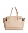 With its pristine almond leather and cleverly designed locked side pockets, Salvatore Ferragamos oversized tote is an exquisitely chic take on this multi-season style - Double top handles, zippered curved side pockets with hinged logo lock closures, zippered top panel, extra roomy interior, inside zippered back wall pocket, 2 front wall slot pockets, protective feet - Perfect for sleek city getaways or extra busy days at the office