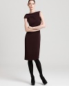 Rendered with a hint of stretch, this Rachel Roy sheath dress glides over your curves for a flawless, feminine silhouette. Modernize the classic style with chic tights and sculptural heels.