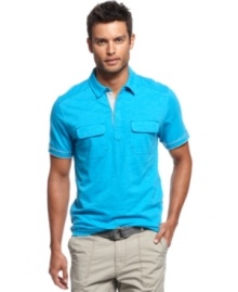 Change up your polo style with this snap placket shirt from INC International Concepts.