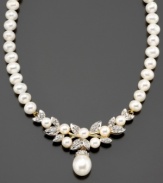 A stunning addition to your evening look. This necklace features cultured freshwater pearl (5 mm, 5-1/2 mm and 9 mm) and round-cut diamond (3/8 ct. t.w.) set in 14k gold. Approximate length: 17 inches.