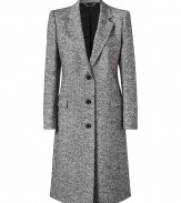 Luxurious coat in a fine virgin wool blend - Fashionable salt & pepper look - Classic single-breasted with three decorative buttons - Knee length - Slim fit and tailored - The details: long sleeves, slightly wider lapels, flap pockets - A classy, all-around talent you can combine many ways and will wear for years - Wear with a pencil skirt, jeans, straight cut trousers or, for evening, over a cocktail dress