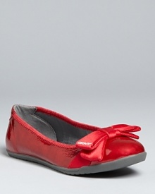 Satin bows on shining patent atop athletic-inspired bottoms keep these DKNY ballet flats in their own class.