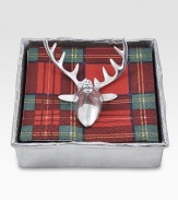 Get into the spirit of the season with this handcrafted cocktail napkin holder, defined by a reindeer paperweight and an organic, naturally shaped rim. Napkins not includedRecycled aluminum5¾W X 1½H X 5¾LHand washImported