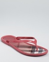 Burberry's signature check print lines the footbed of these laid-back summer sandals.