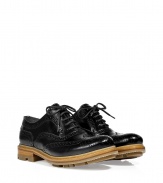 Take your menswear-inspired look to the next level in these modernized leather brogues from Jil Sander - Classic brogue style with perforated details and wingtip styling - Lace up, contrasting neutral hued sole, low chunky heel - Style with cropped trousers, a draped tee, and an oversized blazer