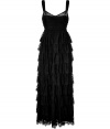 Luxe maxi dress in fine, black synthetic fiber blend - Gorgeous, multi-tier lace overlay - Shirred bustier with slim straps and sheer detail at d?colletage - Straight, floor-length skirt - Zips at back - Fitted and ultra-feminine, a knockout for parties and events - Pair with strappy sandals and a colorful clutch