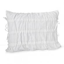 A chic, airy cotton decorative pillow from DKNY.