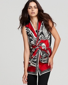 Draped, wrapped or tiedthis dramatic scarf-print top boasts statement-making style for bold days and elegant nights. Punctuate little black pants with the signature designer look for uptown sophistication thats fit to print.