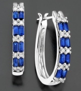 Baguette-cut sapphire (1-3/8 ct. t.w.) and round-cut diamond (1/4 ct. t.w.) alternate for a stunning effect on these 14k white gold hoop earrings. Approximate length: 3/4 inch. Approximate diameter: 1/2 inch.