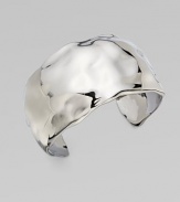 This bold, undulating cuff has a stunning liquid look and a polished gunmetal cast.Ruthenium platedDiameter, about 2¼ (adjustable)Width, about 1½Imported