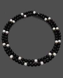 Let the sheer beauty of black and white enchant any outfit. This necklace features luminous cultured freshwater pearls (8-9 mm) and onyx (8-9 mm). Approximate length: 36 inches.