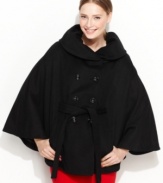 Calvin Klein's elegant cape is also surprisingly flattering. The dramatic swing silhouette compliments all figures, while the belt defines the waist.