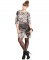 A chic feather-inspired print on ponte makes this plus size dress from Jessica Simpson as stylish as it is easy to wear. Tights and booties finish the look in a snap.