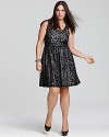 Luxe lace embellishes this pretty Love Ady dress, creating a ladylike update to the always-essential LBD.