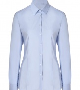 Detailed in a flattering blend of stretch cotton, Hugos feminine fitted shirt is a smart investment perfect for setting the foundation for workweek looks - Classic collar, long sleeves, buttoned cuffs, button-down front, tailored seaming, shirttail hemline - Figure-hugging cut - Wear with practically anything for a clean, tailored look