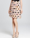 Get spotted in style with this pleated Moschino Cheap and Chic skirt adorned with eye-catching pop art print.