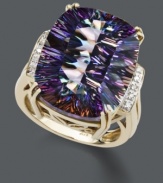 Capture a myriad of colors all in one beautiful cocktail-style ring. Crafted in 14k gold, a large mystic topaz gemstone (11 ct. t.w.) is decorated at the sides by sparkling diamond accents.