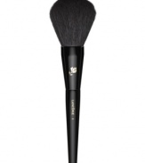 This full, natural-bristled brush is the ideal partner to all powders. The improved design and hair quality reduces fall-out, and the new rounded shape provides better powder application. How to use: Dip the brush into the powder and remove excess. Sweep the brush around the perimeter of the face and back toward the hairline. Finish with downward strokes, including the t-zone.