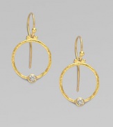 From the Clover Collection. A simple, delicate 24K gold hoop with sparkling diamond accent.Diamond, 0.24 tcw 24K yellow gold Length, about 1 Width, about ¾ Ear hooks Imported 